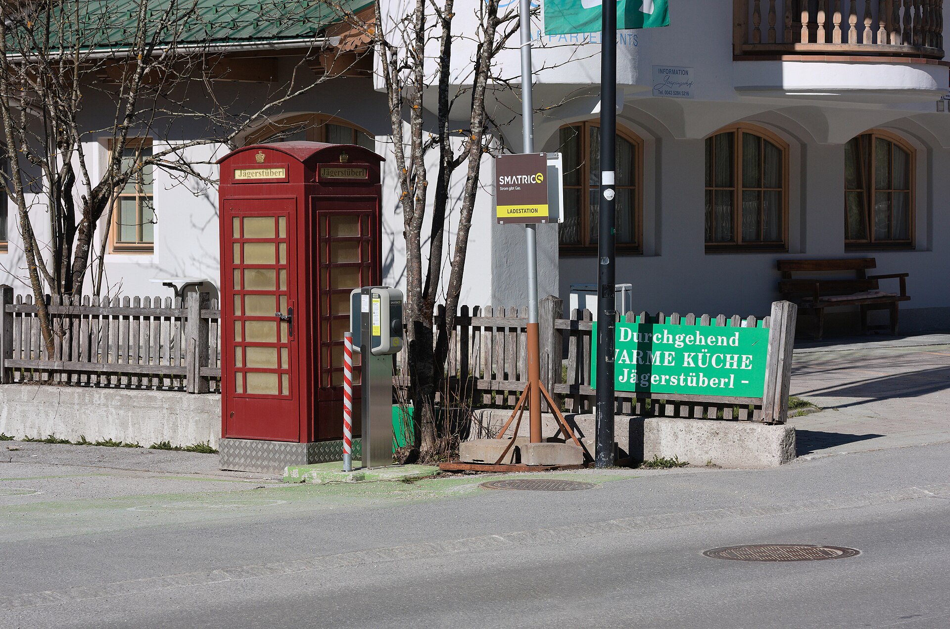 An electric vehicle charging station beside an alpine road in Gerlos, Tyrol.