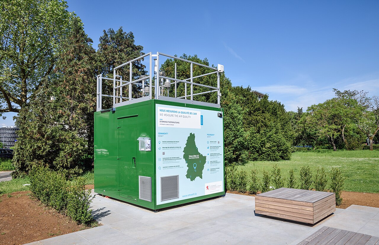 Automatic air quality monitoring cabinet standing in a city square