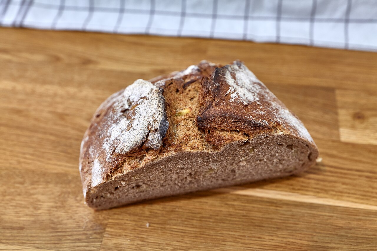 Sliced dark rye loaf of the Kartoffelkruste type from a Berlin bakery