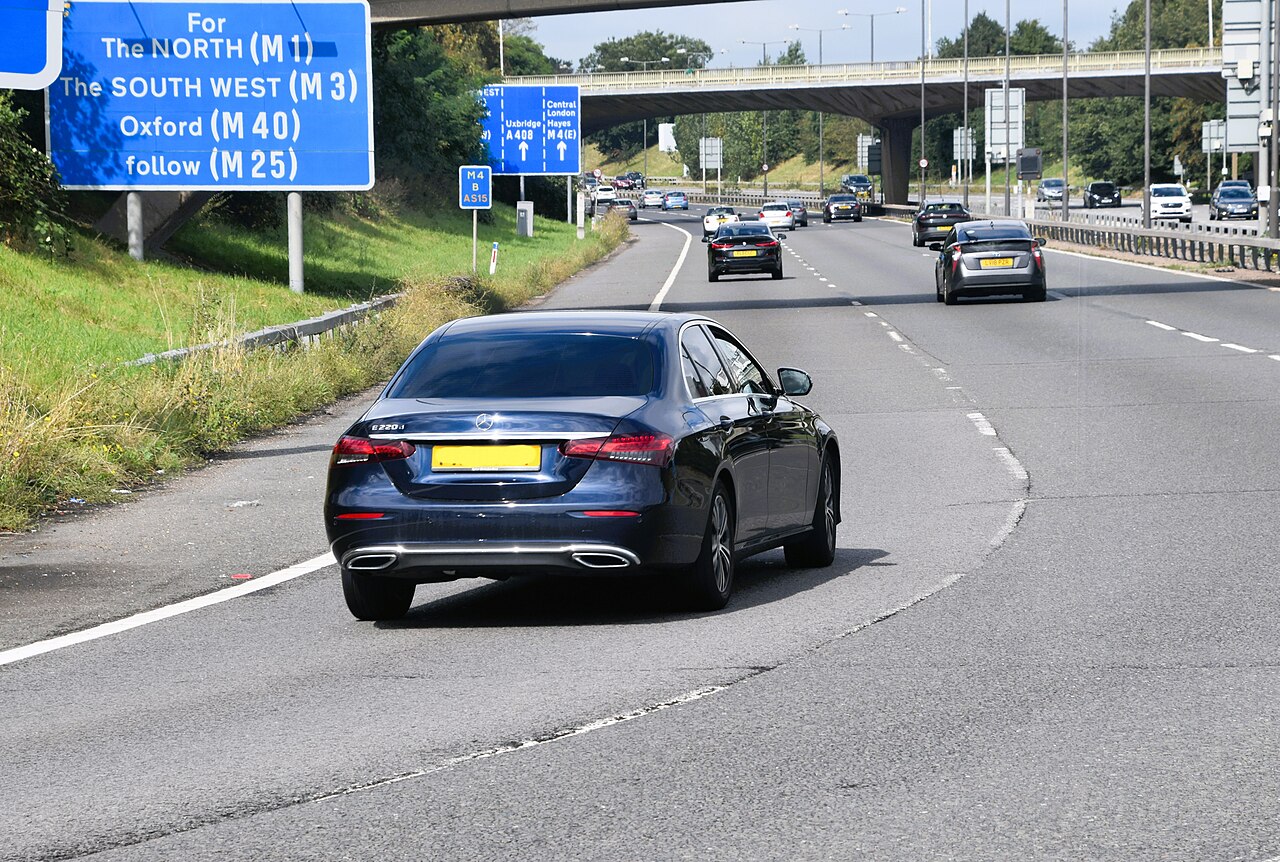 Large executive saloon with a two-litre diesel engine parked at the kerb
