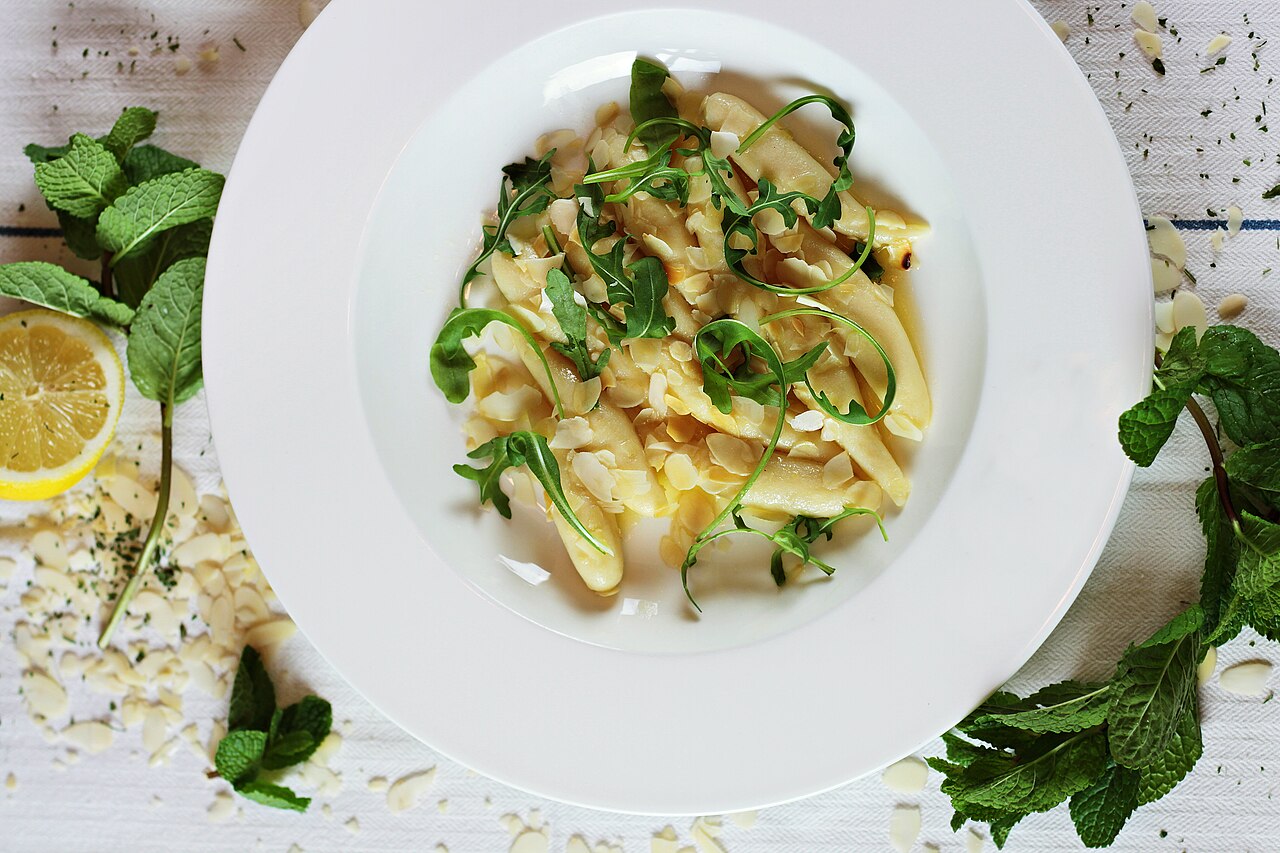 Uncooked gluten-free gnocchi arranged on a work surface