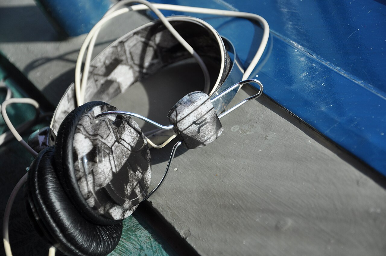 Black over-ear headphones with a padded headband, photographed against a plain background