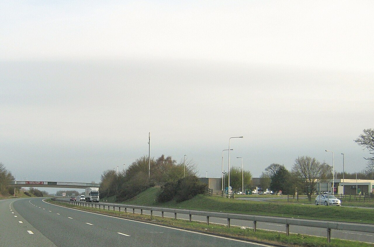 Motorway service area buildings and car park beside the carriageway