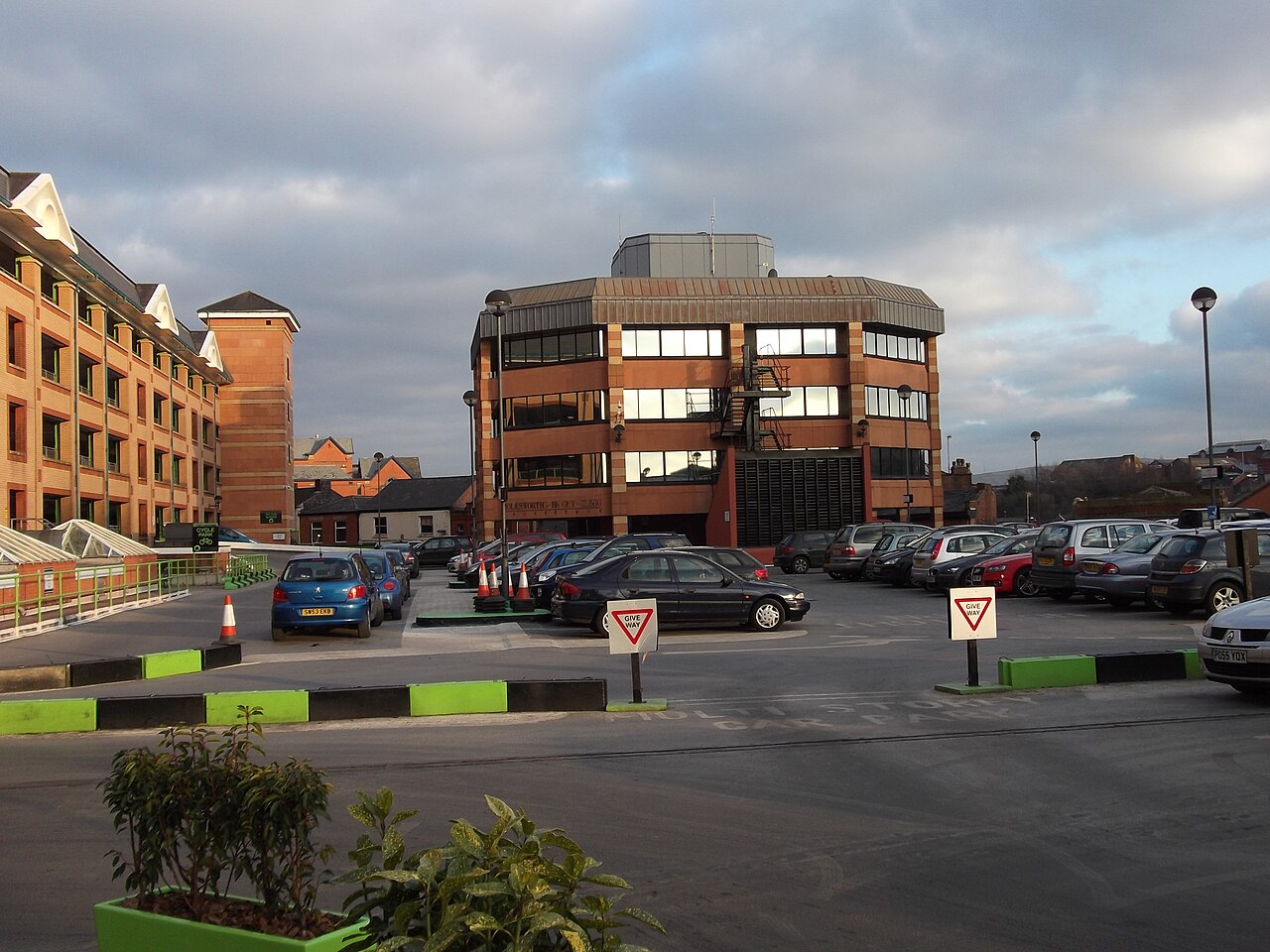 Concrete multi-storey car park seen from street level
