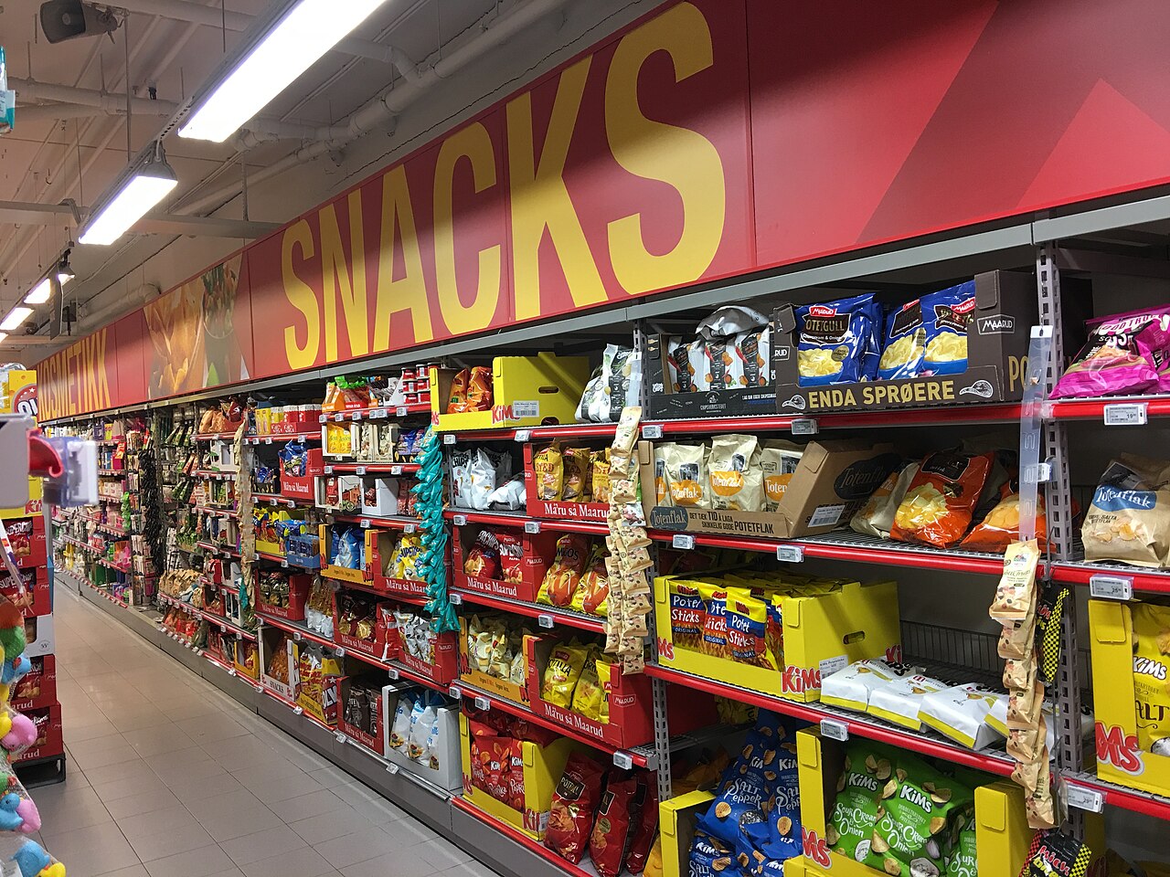 Shelves of packaged snacks in a Coop supermarket in Bergen, Norway